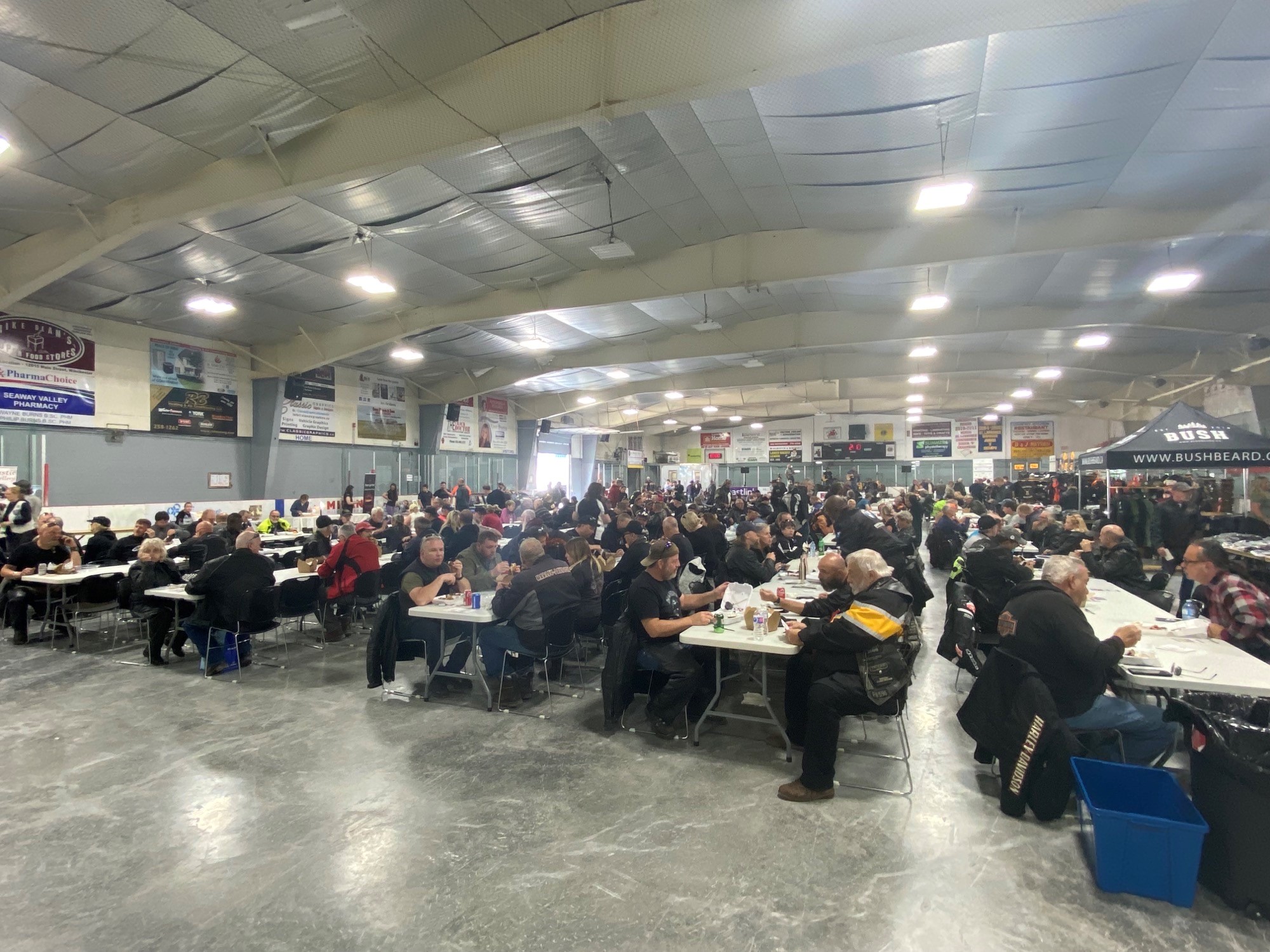 riders eating dinner in arena