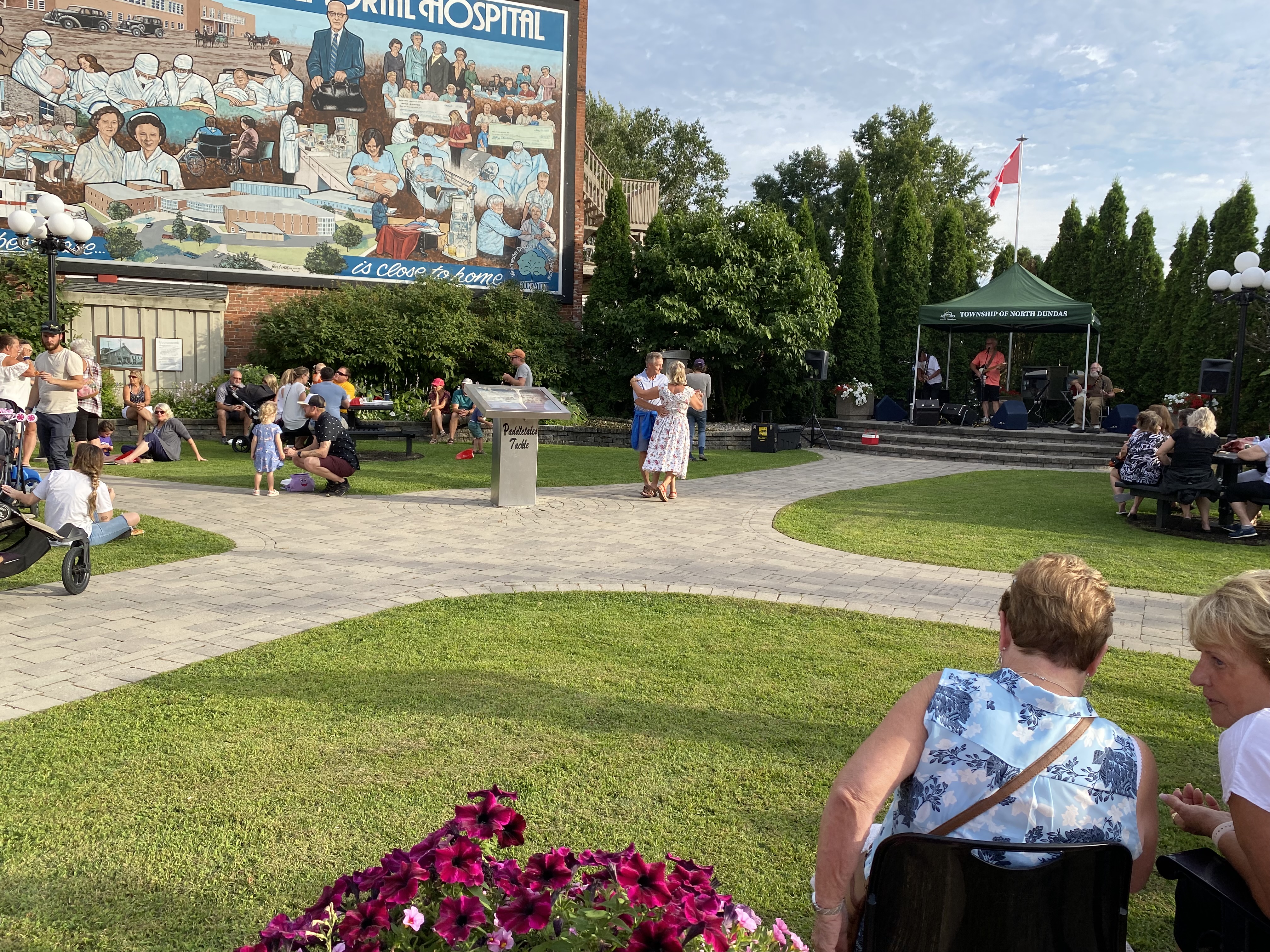 Dancing to live music in Sweet Corner Park at MMOMS Winchester