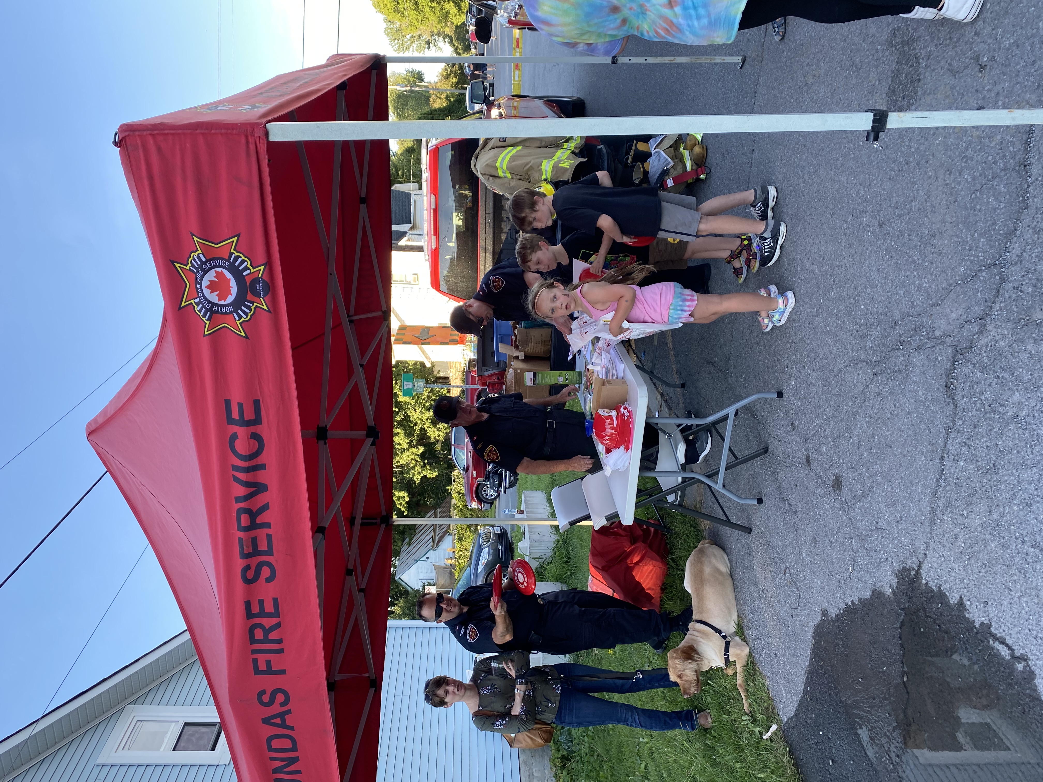 People lined up at Fire Prevention booth in Hallville at MMOMS