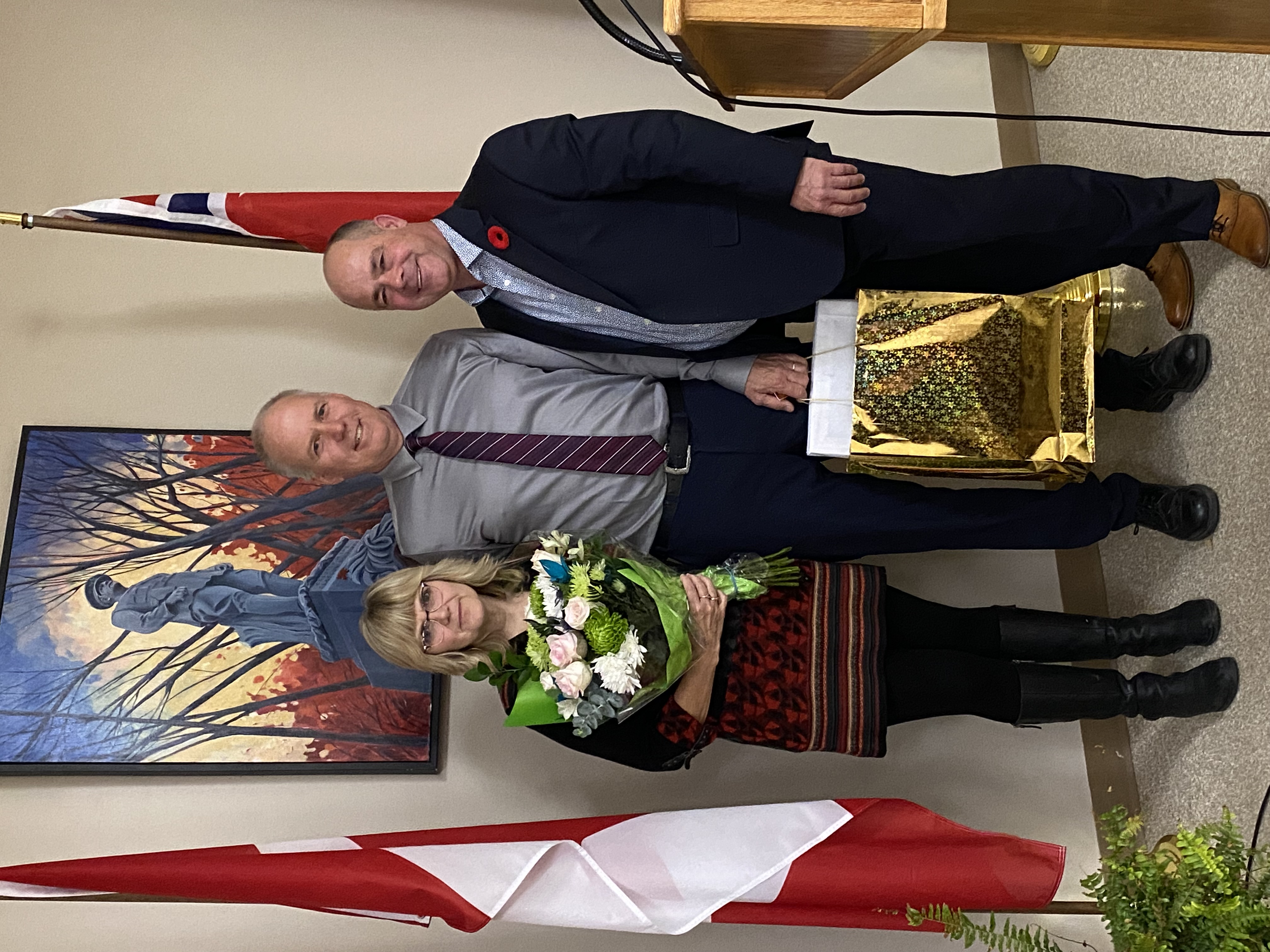 John, Christina and Tony group retirement photo