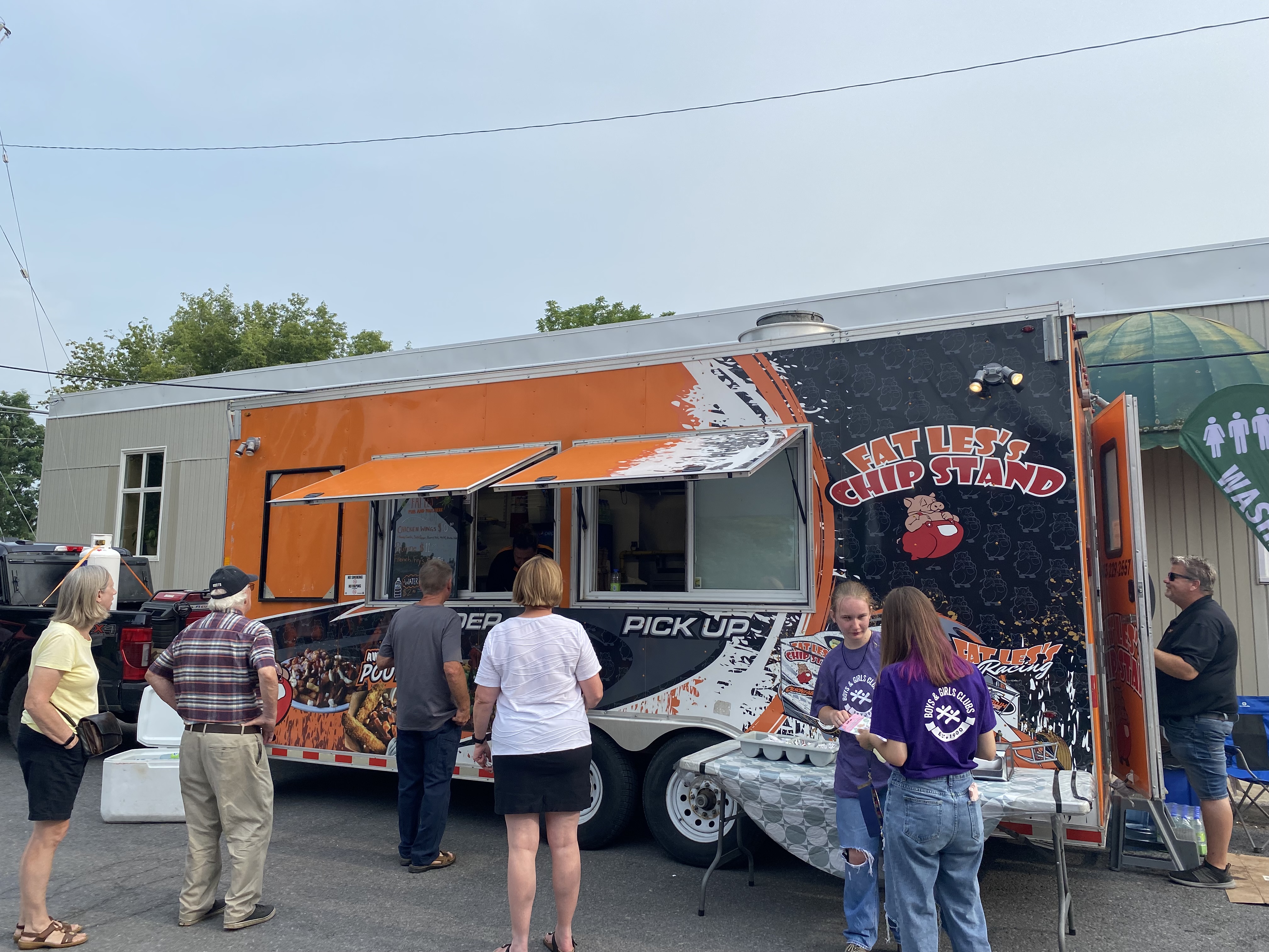 food vendor truck with line up of people