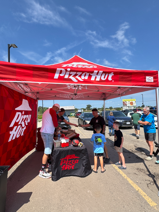 Customers in line at Pizza Hut