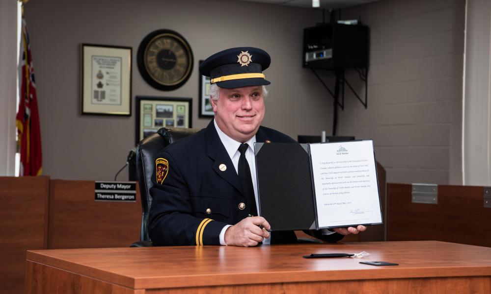 Chief Kreg Raistrick at desk