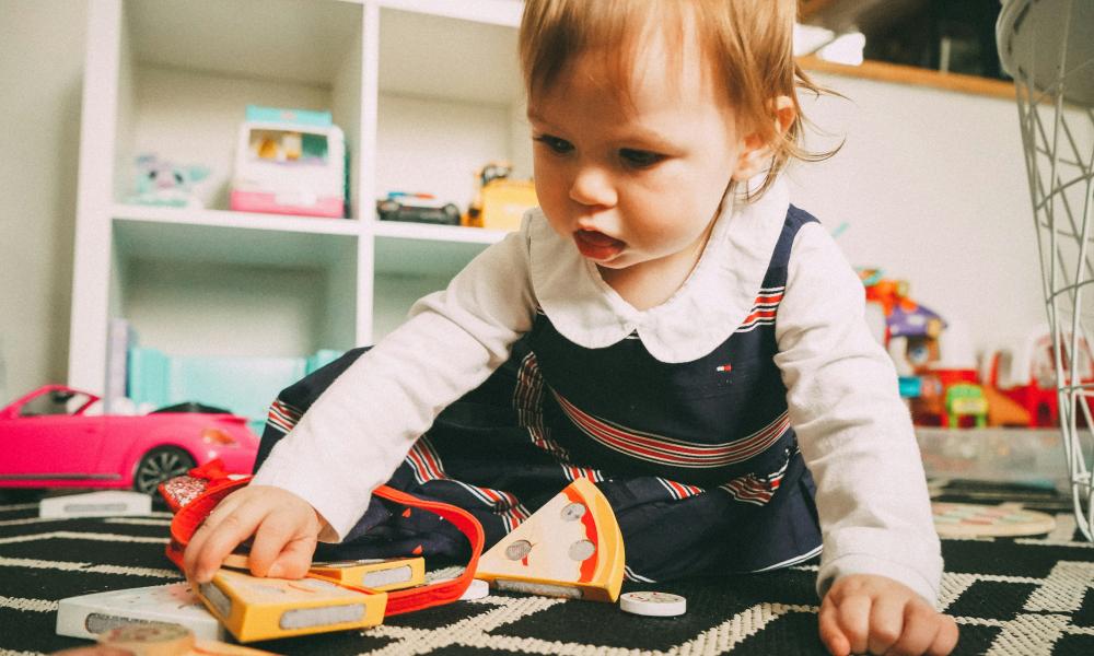 child playing on floor