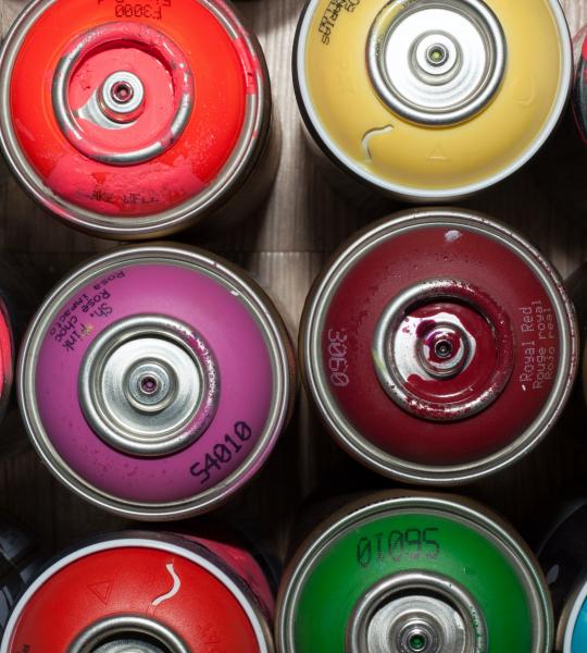 Multi coloured spray paint cans
