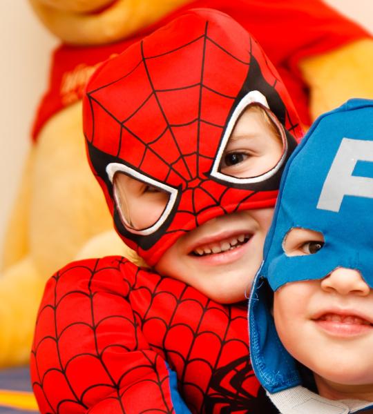 kids dressed up like superheros