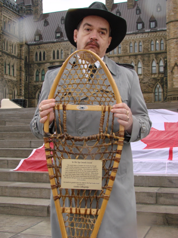 Gordon Collingridge Holding Snowshoe