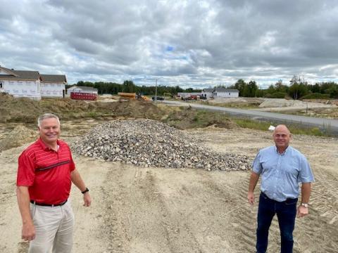 Director of Planning, Building and Enforcement Calvin Pol stands with Mayor Tony Fraser in the Wylie Creek Estates Subdivision in Hallville. 