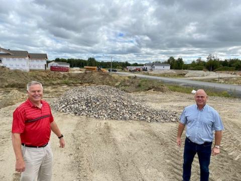 Director of Planning, Building and Enforcement Calvin Pol stands with Mayor Tony Fraser in the Wylie Creek Estates Subdivision in Hallville.