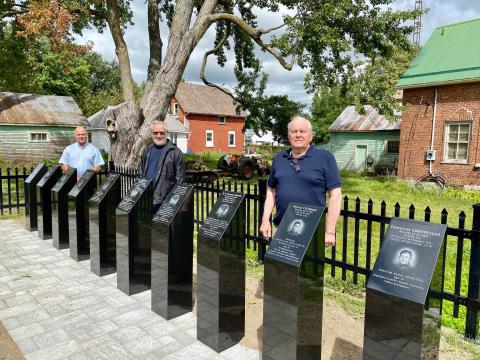 Morewood Cenotaph committee members and Mayor Tony Fraser stand behind the new mini-monuments.