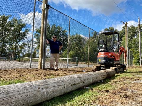 Jeremy Heerkens with Dundas Power stands by one of the light poles.