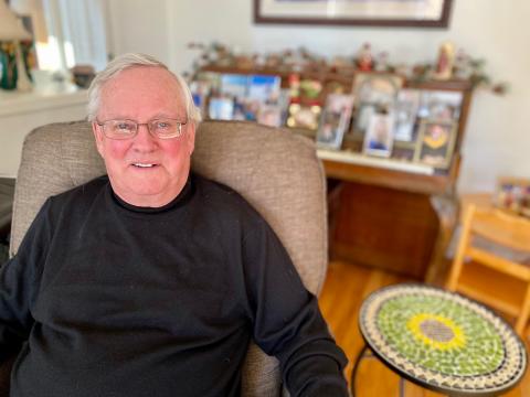 Charlie Graham relaxes in his favourite chair at home in Chesterville. 