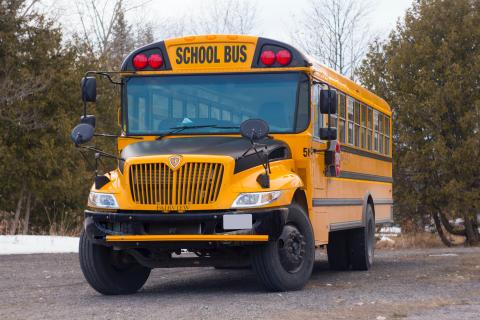 yellow school bus in parking lot