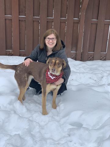 Pictured, Erin Kapcala with her dog. 