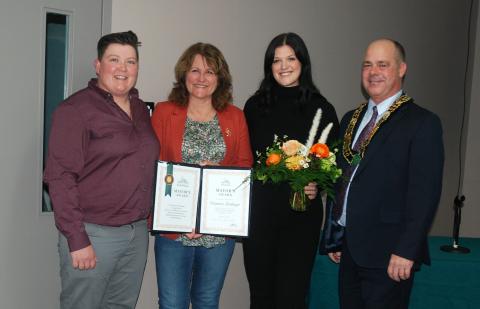 Pictured, from left, Vicki Van Hoof, Heather Cooke Erwin, Cinnamon Boulanger and Mayor Tony Fraser. 