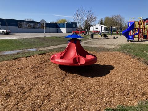 Red ten spin playground equipment