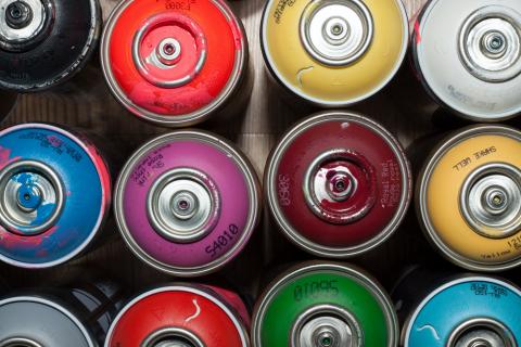 Multi coloured spray paint cans