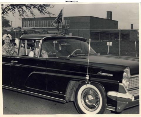 Queen in car