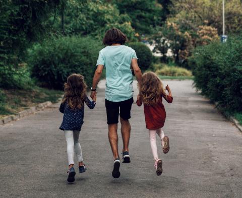 baby sitting image walking in park