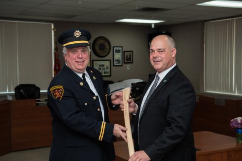 Chief Raistrick standing with Mayor