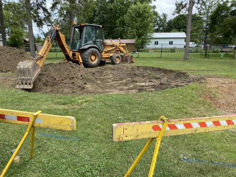 Digger making big hole in ground